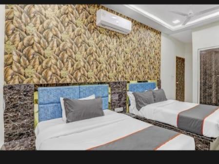 Hotel Bhavya Residency Ahmadábád Szoba fotó