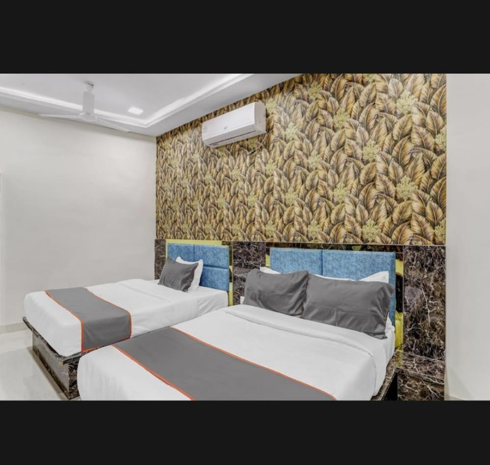 Hotel Bhavya Residency Ahmadábád Szoba fotó